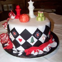 Twilight Series Cake I incorporated parts of each book cover. The Apple from Twilight, Red & White Parrot Tulips from New Moon, Red Scarf from Eclipse, and...