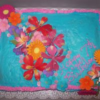 Tropical Floral Theme Cake As requested by my daughter who was having a tropical themed pool party. A confetti cake, with blue and pink butter cream icing and...