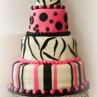Aimee_Cake_Copy.jpg a 3 tier cake for a birthday party. the theme was zebra stripe and pink! tfl