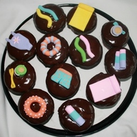 Pool Party Cupcakes Inspired by a ton of different cakes/cupcakes on CC and Flickr. Chocolate cupcakes with whipped ganache filling and smooth ganache icing.