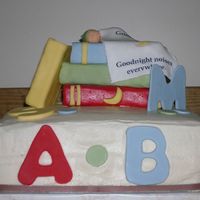Book Baby Shower I made this cake for a friend whose nursery is decorated in a book theme. It is a 12in. white chocolate cake with white chocolate raspberry...