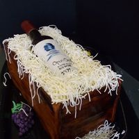 Sugar Wine Bottle Cake Double Choc cake with peanut butter filling. Box is painted fondant, straw is chocolate modeling paste, and bottle is sugar. Label is...