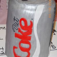 Soda Can This is 14 layers of chocolate cake wrapped in fondant and painted with sliver dust mixed with vodka.