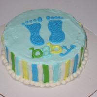 Baby Boy This cake was custom made to match the shower invitation. The order was for cake and matching cupcakes. Chocolate cake with vanilla...