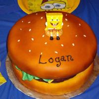 Crabby Patty Birthday Cake "Crabby patty" birthday cake for my son's 7th birthday. Fondant covered with RCT patty.