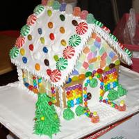 Wilton Gingerbread House 2008 I used the re baked, not assembled, Wilton House Kit then decorated and assembled. I was doing houses with my nephews so we had some extra...