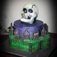 3D Skull And Cemetery The cake is 15" hexagon, 10" round and 3D skull. The skull is Red Velvet cake. The other 2 are marble caked with White Almond...