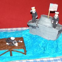 Navy Retirement Cake Carved and iced in butterceam. the figures are hand molded from gum paste. I had some serious engineering issues, but overall, a huge...