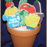 Vegetable Garden Cookie Bouquet NFSC iced with royal icing. Cookies are custom cut from images from the internet. I couldn't find the shapes I wanted in cookie...