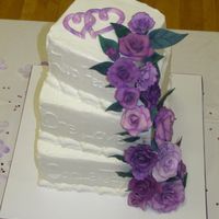 Purple Roses And Square Tiers Pretty sure this was 8", 10" and 12" squares. Chocolate for the bottom tier and Vanilla for the other 2. Iced with...