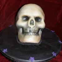3D Airbrushed Skull Wilton 3D skull pan. Red Velvet cake, fondant, airbrush. Marbled fondant cake board. First time really doing a 3D cake and using the...