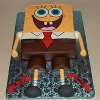 Sponge Bob Cake is double layer chocolate and vanilla filled with buttercream and iced in buttercream. His bottom half is covered in white chocolate...