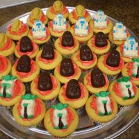 Star Wars Cupcakes these were for my little brothers class for his 8th birthday. the molds are from about 20 years ago when my older brother loved star wars...