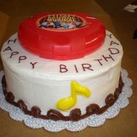 Happy Birthday this is a vanilla chocolate chip cake with vanilla buttercream. The customer supplied the cake topper.