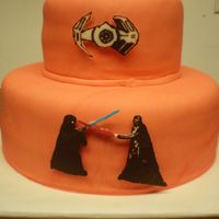 Star Wars Cake This is the back of the cake for my little brothers 8th birthday before darthvaders head was added on top (in my other photo). he insisted...
