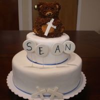 Babtism This is for my neighbor who just had a baby. She asked me to do her baptism cake for the new baby Sean Gregory. yellow cake on bottom...