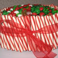 Christmas Candy Barrel Cake My first candy barrel cake. It was quite a hit at work. Someone even started eating the cand off of it thinking it was a bowl of M&Ms....