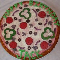 Pizza Party My son's 4th birthday party was at the local pizza place, so I made this pizza cake. The "cheese" is shredded white...