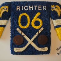 Hockey Jersey 6th birthday cake for a Buffalo Sabres hockey fan.