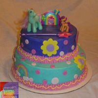 My Little Pony My friend's daughter wanted a My Little Pony cake, so I just used some of her toys. I layered the inside (thanks Rainbowlicious!) so...
