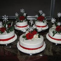 Winter Wedding Home made snowflakes as a winter touch to traditional wedding cake.