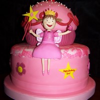 Pinkalicious Pinkalicious birthday cake for a friend's daughter 6th b-day..All strawberry cake. Figure is made from gum paste.