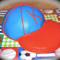 Baseball Hat Cake I did this cake for my best friend's little boy's 1st birthday...he didn't want to put his hands in it LOL First time I did...