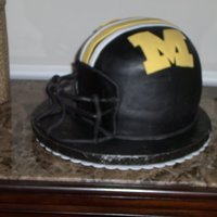 Mu Helmet Chocolate cake with carmel filling and fondant icing .I used soccer ball pan and 2 9 inch cakes and then carved them.Thak you every one who...