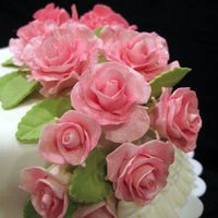 Rose Swag This is a close up of the rose swag from my 2 tier wedding cake for Wilton's class 3. They are made of a fondant/gumpaste mix, and...