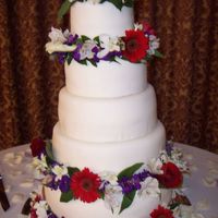 100_2786.jpg Stacked rounds with real flowers.