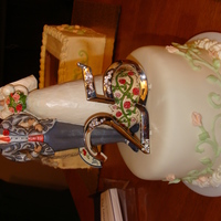 25Th Anniversary Cake The topper is way too huge for this little cake! But it was sentimental to the family so up on top it goes! fondant with buttercream...