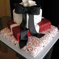 Black And Red Packages Wedding Cake Fondant icing and Bow with gumpaste calla lilies