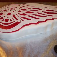 Red Wings My sister is a huge red wings fan and I saw this cake done by cwindho and had to try it mine is not as nice as hers but my sister loved it...