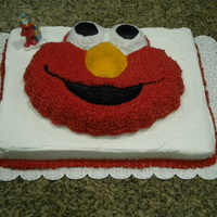 Elmo Cake I used star tip, buttercream frosting, yellow cake.