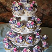 Garden Cupcakes Cupcakes with gum paste flowers, silk meringue buttercream, and Whimsical Bakehouse yellow cake recipe