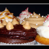 Assorted Cupcakes I made these for my husband to take to work. Assorted flavors: peanut butter & jelly, peanut butter chocolate, chocolate caramel turtle...