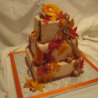 Fall Leaves Wedding Cake Handmade gumpaste fall leaves, twigs, acorns and berries. I was so happy with how this cake turned out, and I got a phone call later that...