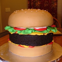 Giant Hamburger Gianormous Triple Chocolate fudge cake (8") with MMF and Ketchup, Must, and Mayo Buttercream (Vanilla). 7" Tall