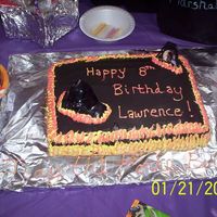 Darth Vadar Cake for my son's 8th Bday. This was his choice. I wanted to do the volcano scene, but this was much easier. So he made a good choice...