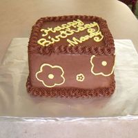 Mandy's Birthday This was a Chocolate Chip WASC cake. Very rich but DELICIOUS!!!! Chocolate buttercream icing with yellow vanilla buttercream decorations! I...