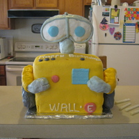 Wall-E I made this for my son's birthday. It's a chocolate and green checkerboard square cake (I think it might have 4 layers) covered...