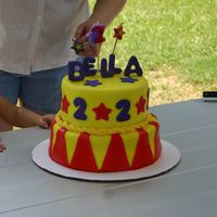2Nd Birthday - Carnival Theme This was my first time using fondant or making a 2 tier cake...I fell in LOVE with it! All decorations are fondant. The cake was for a...