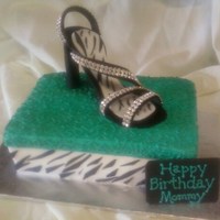 Shoegasm Cake This was made for a stiletto lover's birthday. I used some leftover trim to give it some bling. Shoe is made from gumpaste. Shoebox is...