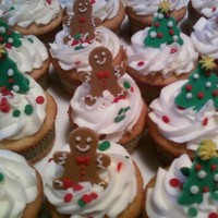 Christmas Cupcakes Gingerbread latte cupcakes with Christmas decorations.