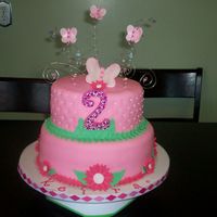 Butterflies And Daisies This is my 3rd Fondant Cake. I ran out of time to finish the bottom tier the way I wanted to, but I still think it looks pretty good. This...