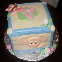 Baby Block With Zoo Animals, Roses And Butterfly Large block cake with all fondant details. This side shows an elephant, the other sides featured a hippo and letters.