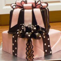 Pink And Brown Gift Box Cake These were for a bat mitzvah - pink and brown theme. Each tier is three cakes (two chocolate and a layer of sugar cookie) with buttercream...