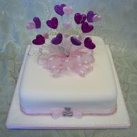 Hearts On Display A fruit cake with a heart display. This cake was for a wedding done as a last minute request for a friend. It was the quickest design I...