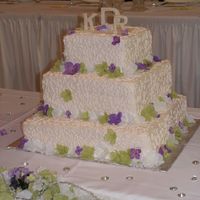 Sister In Law's Cake Regular old white cake with fondant monogram. I really really liked the way this one turned out!