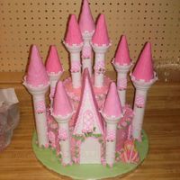 1St Birthday The Wilton castle cake all deck out in pick for a 1st Birthday